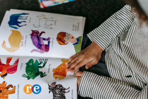 child reading a picture book